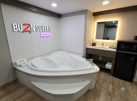Buzen Suites 2030 guest room and amenities Dallas
